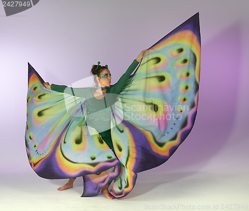 Image of dancing butterfly woman