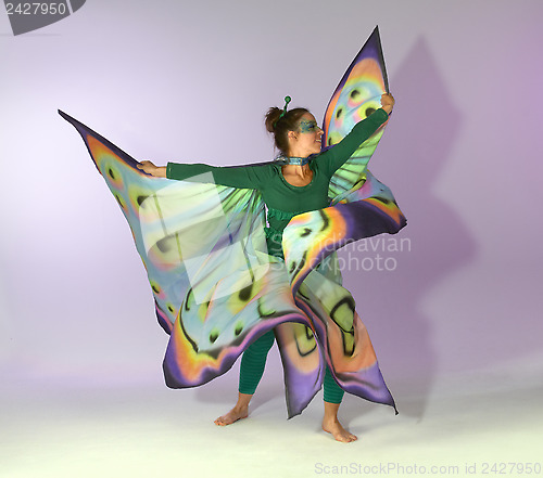 Image of dancing butterfly woman