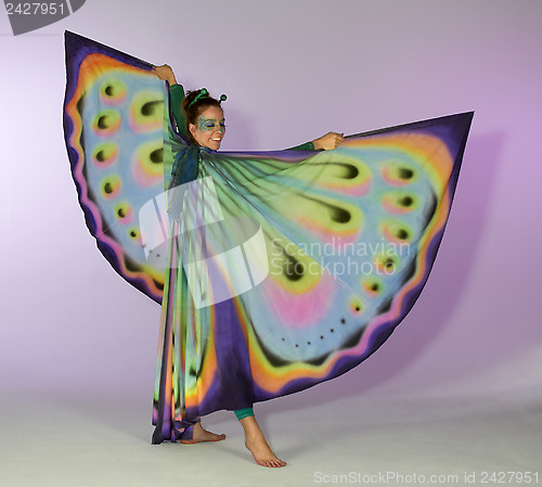 Image of dancing butterfly woman