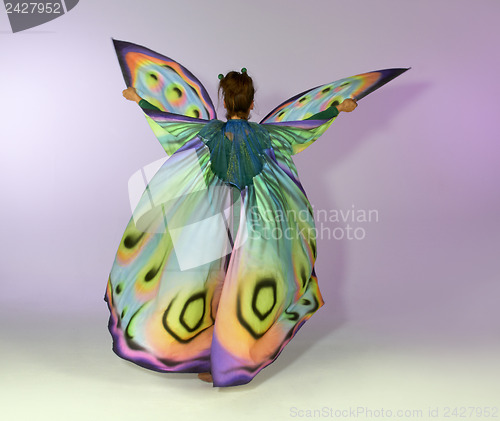 Image of dancing butterfly woman