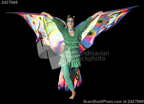 Image of dancing butterfly woman