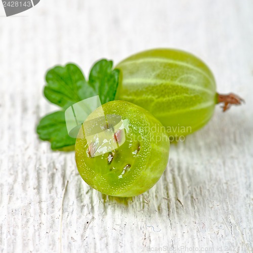 Image of two gooseberries with leaves