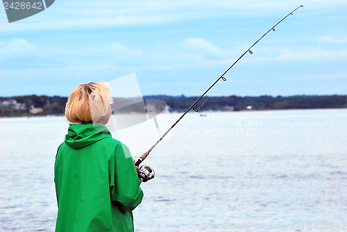 Image of Female fishing.