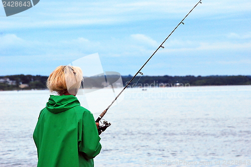 Image of Female fishing.