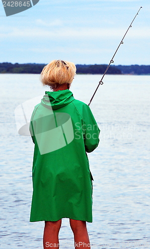 Image of Female fishing.