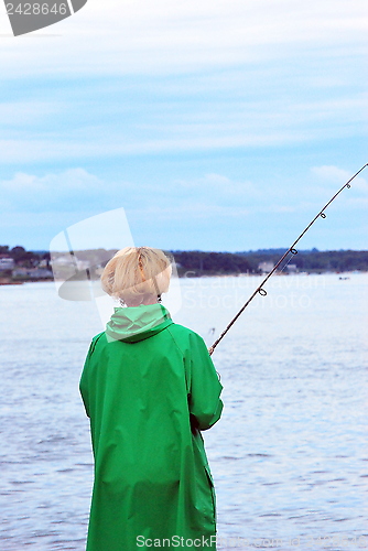 Image of Female fishing.