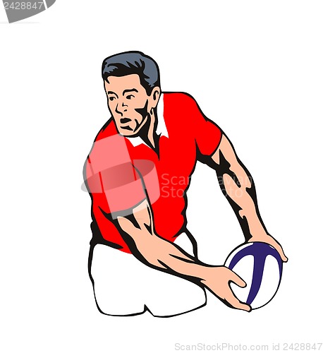 Image of Welsh Rugby player passing ball