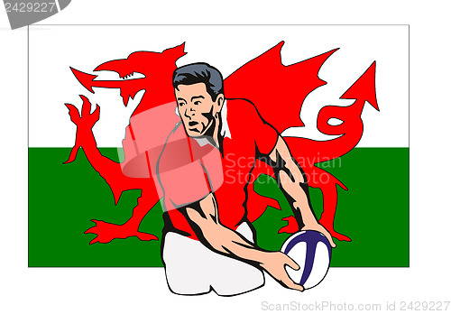 Image of Welsh Rugby player passing ball