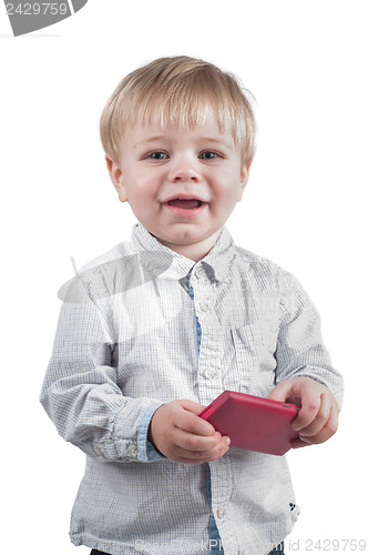 Image of Little cute boy speaking with phone
