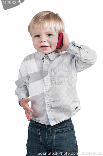 Image of Little cute boy speaking on the phone
