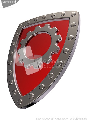 Image of shield with gear wheel