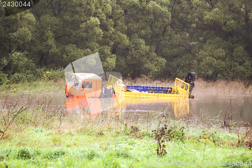 Image of A large truck was drowned in the river water