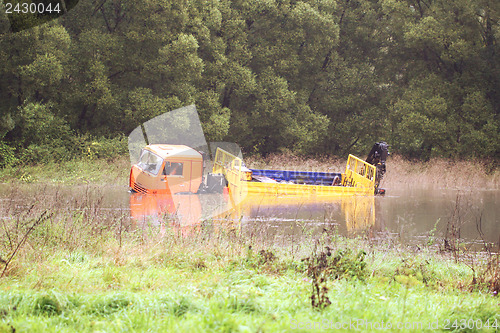 Image of A large truck was drowned in the river water