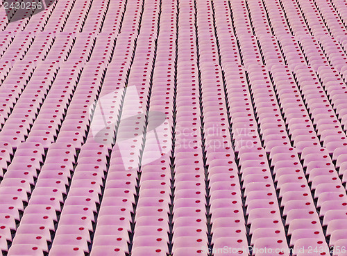 Image of Audience seat in stadium with pink color