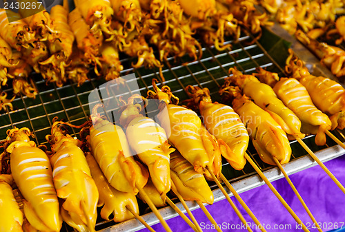 Image of Thai style roasted stick on street