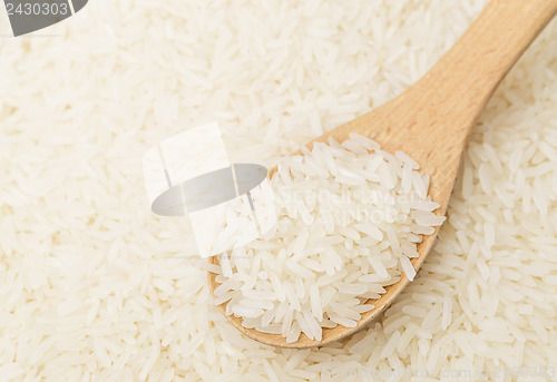 Image of White rice on teaspoon