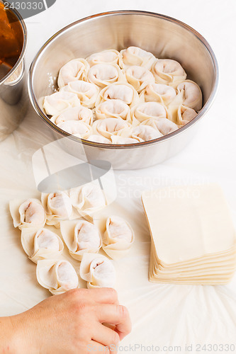 Image of Homemade dumpling with human hand