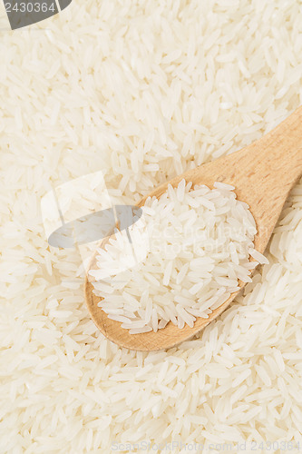 Image of White rice on teaspoon