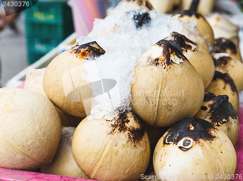 Image of Young coconut drinks on street