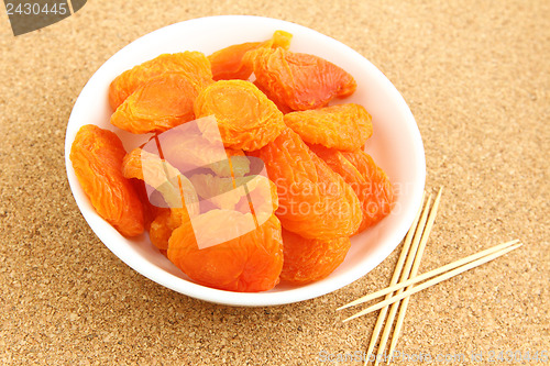 Image of Dried apricots with toothpick