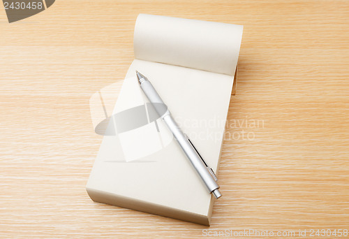 Image of Memo pad and pen