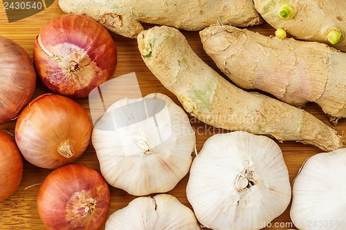 Image of Group of ginger, garlic and allium ascalonicum