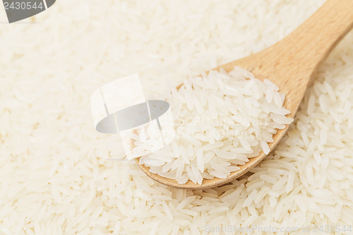 Image of White rice on teaspoon