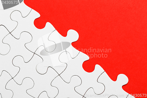 Image of Incomplete puzzle with missing piece