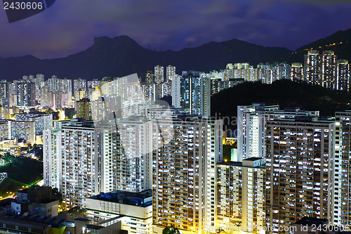 Image of Hong kong city with lion rock at night