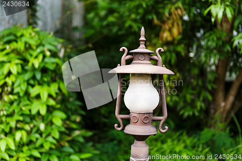 Image of Street lamp in the green garden