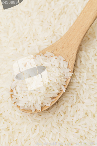 Image of White rice on teaspoon