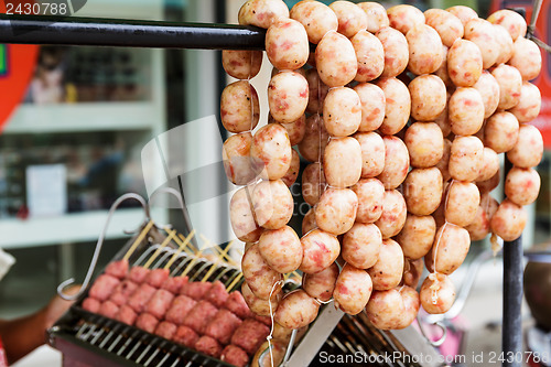 Image of Thai style grilled sausage on street market in thailand