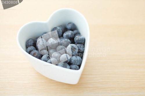 Image of Blueberry in heart shape bowl