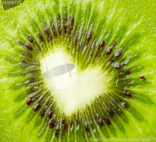 Image of Green kiwi with heart shape