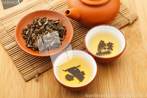 Image of Chinese dried tea leave and drink