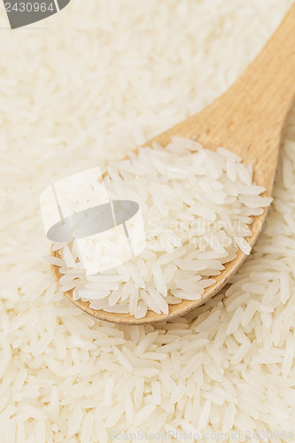 Image of White rice on teaspoon