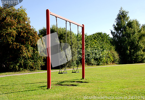 Image of Two swings at the park