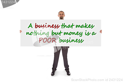 Image of Smiling businessman holding a really big blank card