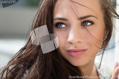 Image of Attractive thoughtful brunette