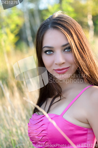 Image of Attractive smiling brunette