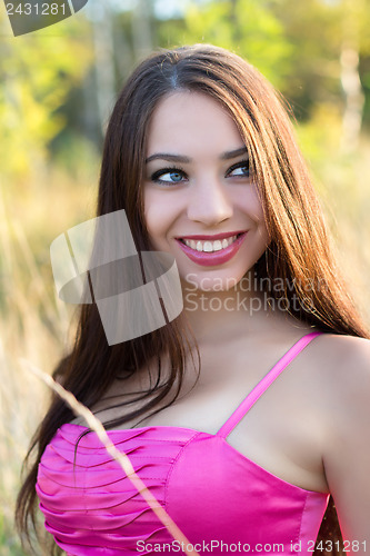 Image of Young smiling brunette