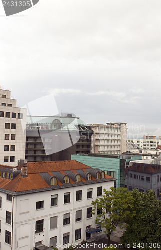 Image of cityscape rooftop view  office buildings apartments condos busin