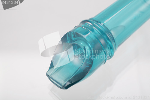Image of Macro shot of a blue plastic flute