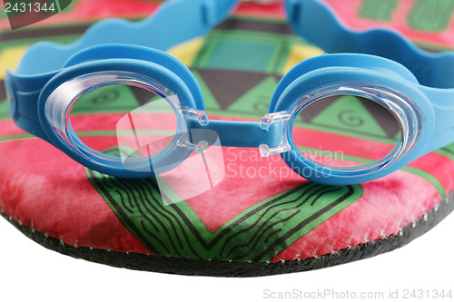 Image of Swim googles and board isolated