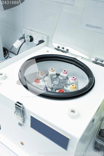 Image of Centrifuge with pathology blood tubes for spinning
