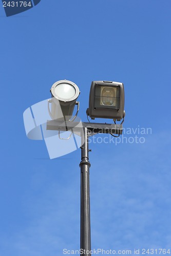 Image of street lamp against the background of blue sky