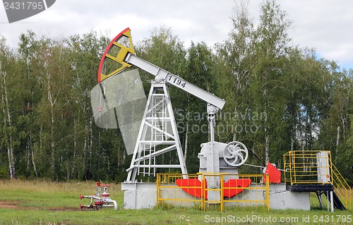 Image of Oil pumpjack. Oil industry equipment.