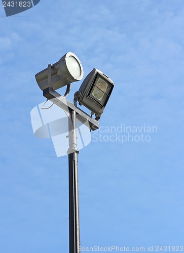 Image of street lamp against the background of blue sky