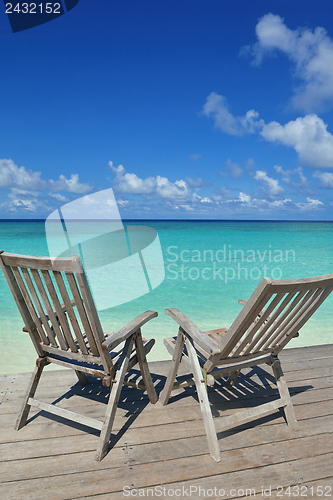 Image of tropical beach chairs