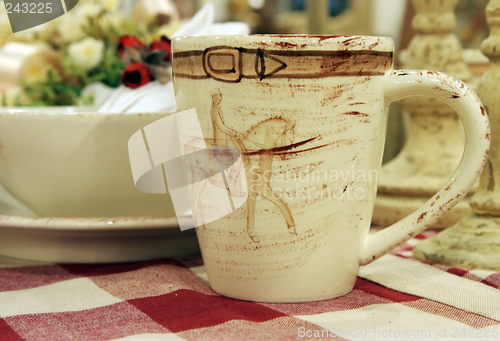 Image of Pottery mug on a table